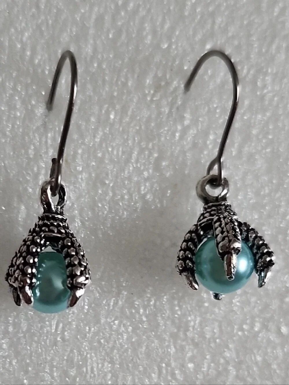 Silver Dragon Claw Drop Earrings with Teal Pearl Accent